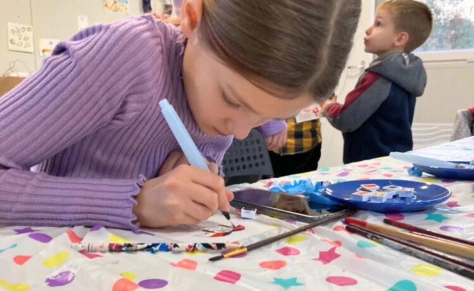 Ukrainian refugee children: fostering connection and joy through paint